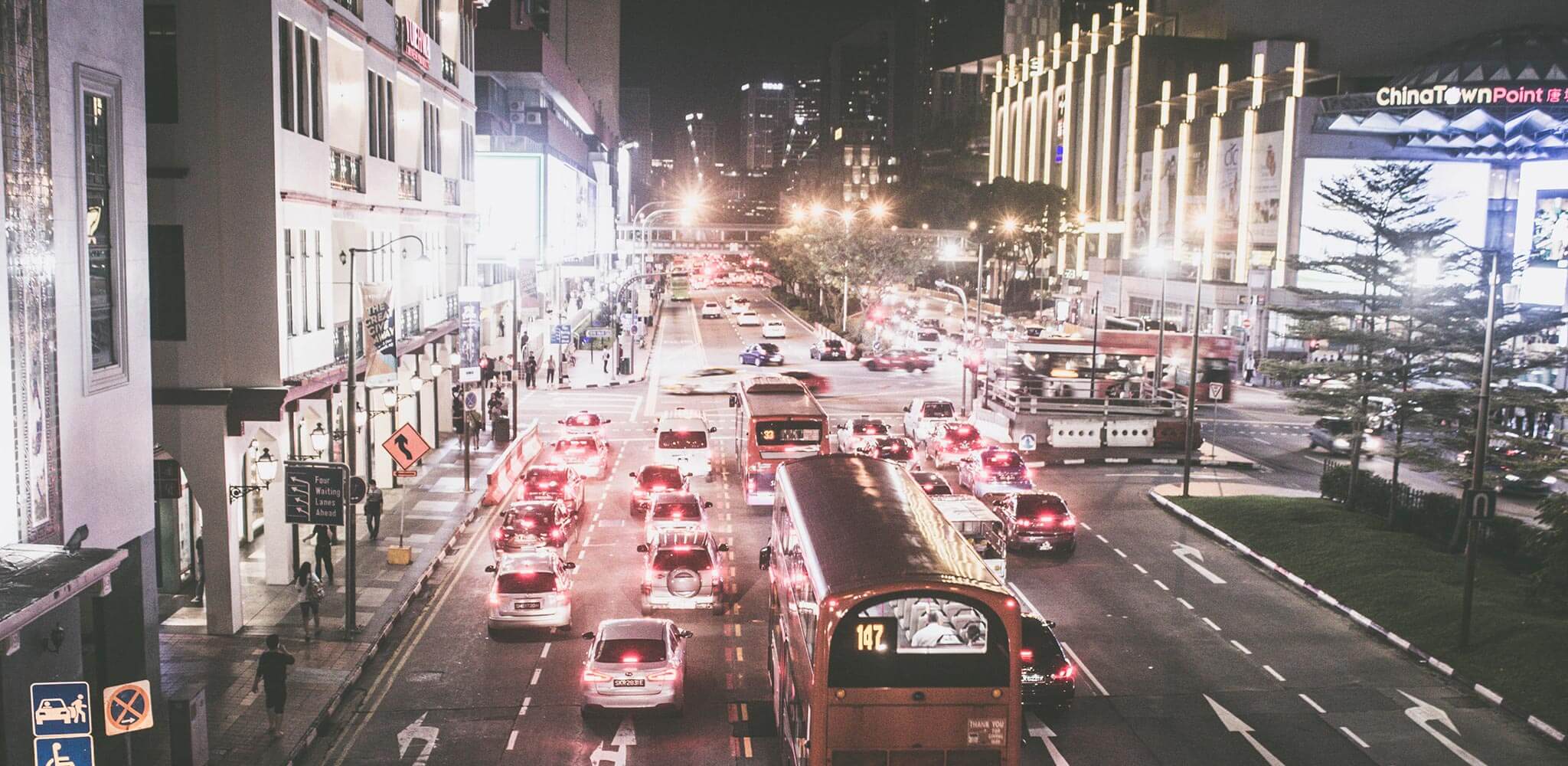 Cars in a night-lit street